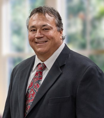 Portrait of John Bunce, Licensed Real Estate Salesperson.